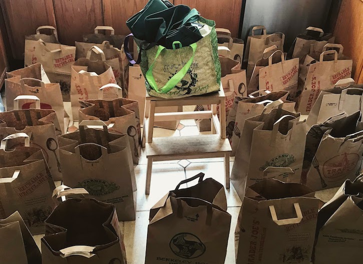 Room full of open paper bags on floor