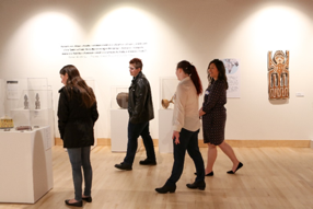 Students walking through museum