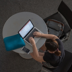 Student with laptop-bird's eye view